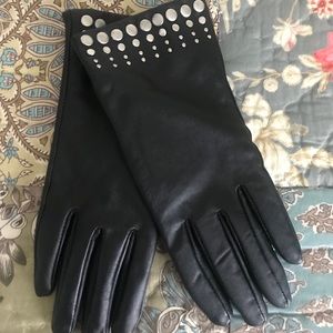 Black leather gloves with silver metal studs